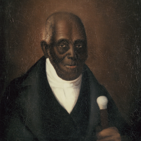 An 1848 portrait of Agrippa Hull depicted as a gentleman wearing a black suit and holding a walking stick with an ivory-topped(?) handle.