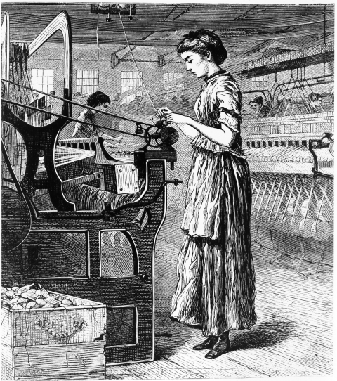 A mill girl is winding shuttle bobbins, a boxful of which appears in the lower left-hand corner. There are other workers in the background of this weave room factory. The mill girl is operating the power loom.