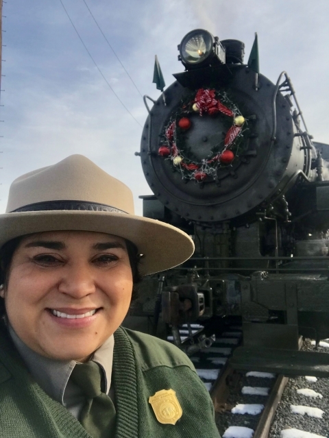 NPS Ranger Flor Blum with Baldwin Locomotive Works 26 at Steamtown National Historic Site