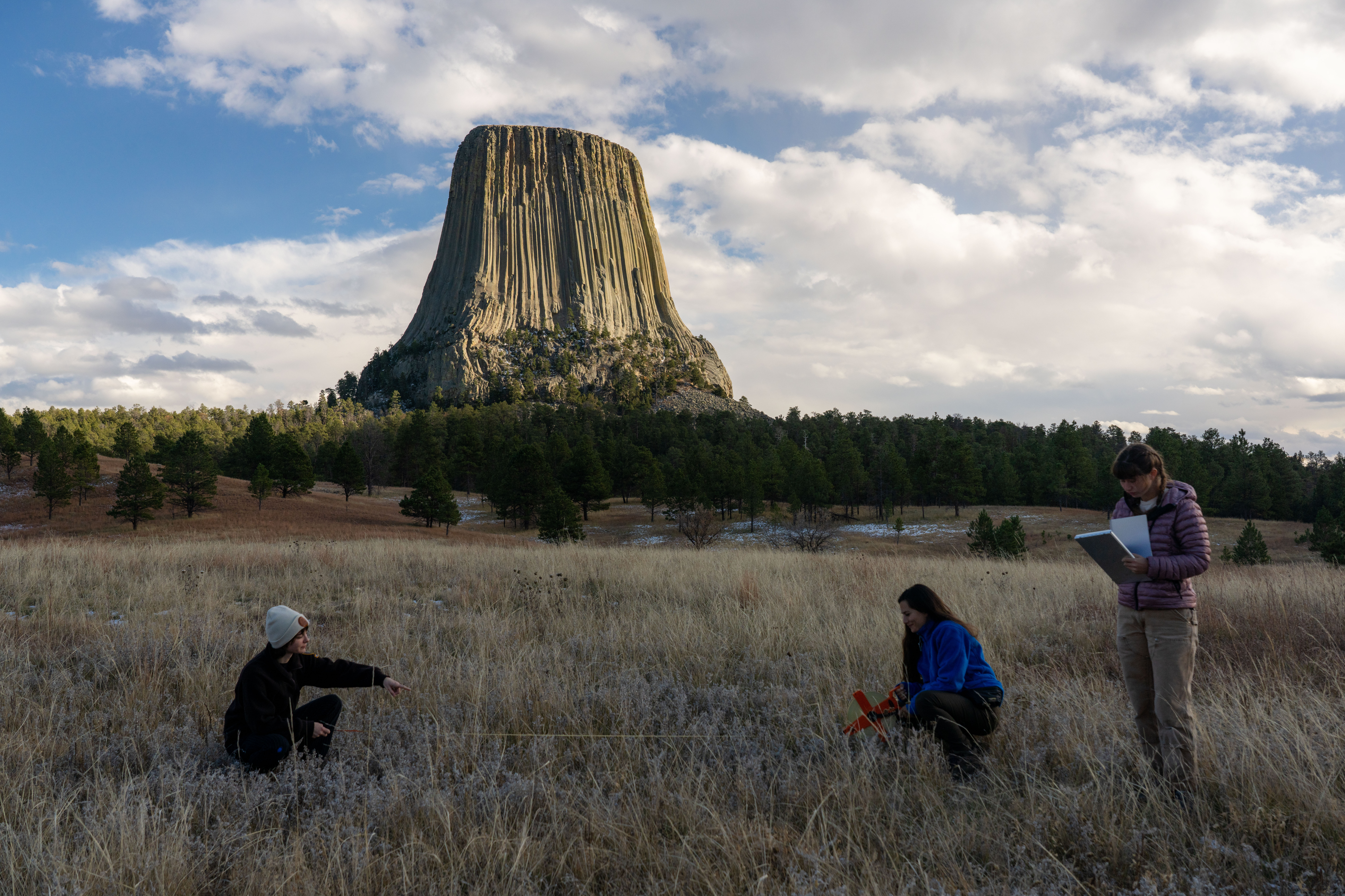 Archeology interns conduct a survey at Devils Tower National Monument