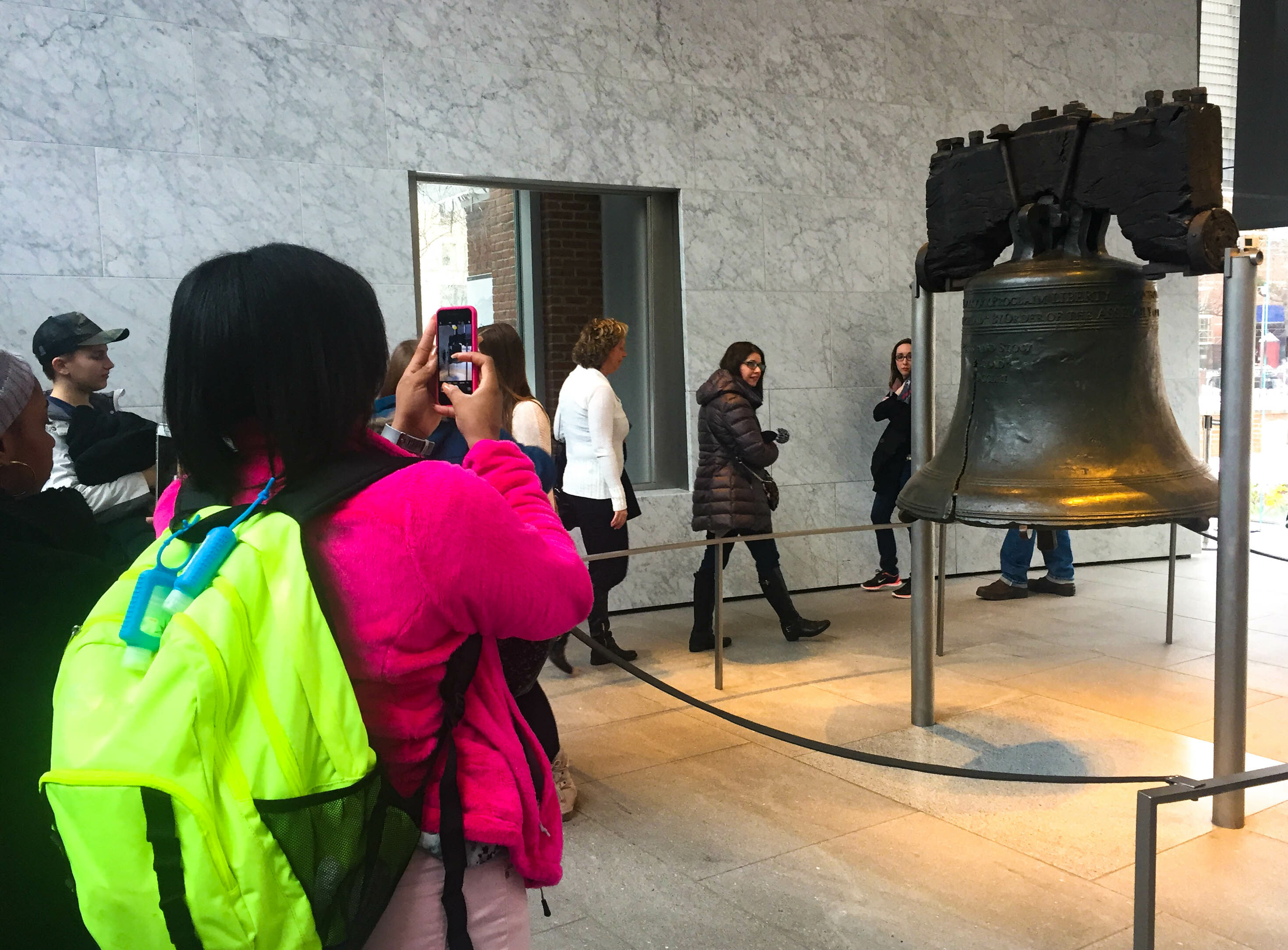 Visitor taking photos of the Liberty Bell